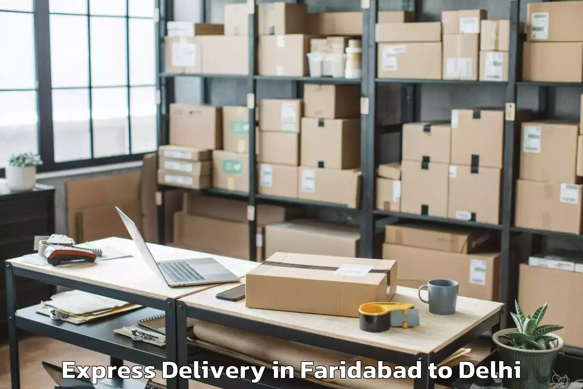 Affordable Faridabad to Unity One Janakpuri Mall Express Delivery